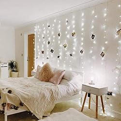 curtain string lights and picture hanging