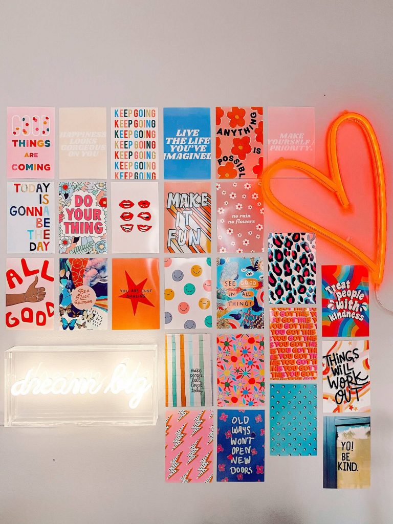 coral wall collage with positive quotes