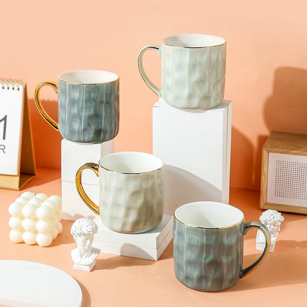 creative ceramic mug with gold ear