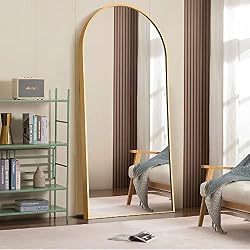 gold arched mirror