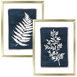 gold frames with botanical wall art