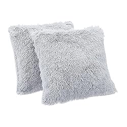 fluffy light gray pillows