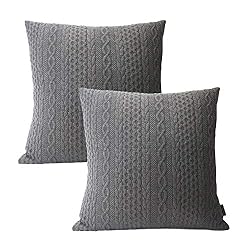 gray embossed pillow