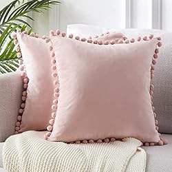 pink pom pom throw pillow