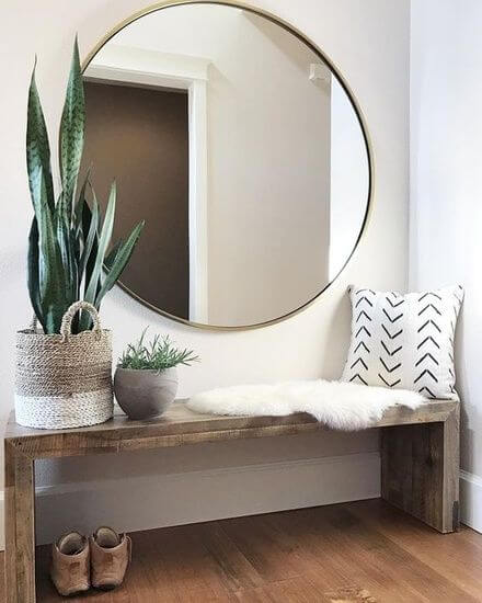 small entryway with bench