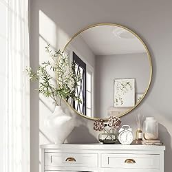 large round gold mirror
