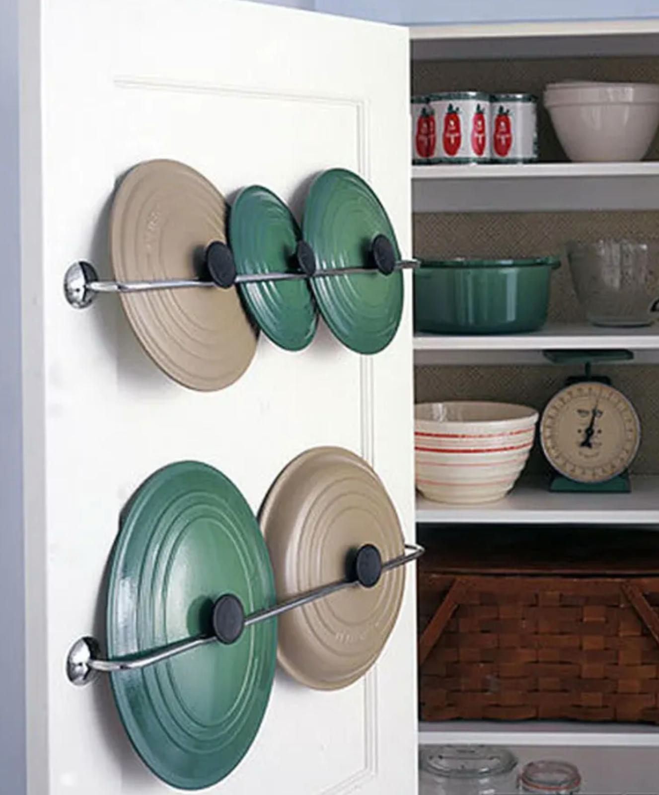 Use towel bars to store lids Use towel bars to store lids