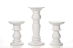 white pillar candle holders