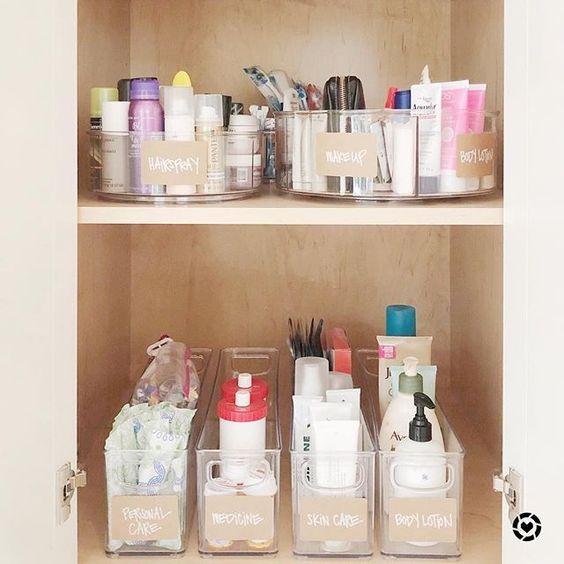 Label everything! organizing bathroom closet with labeled clear containers