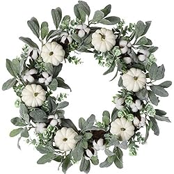 green wreath with white pumpkins