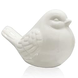 white ceramic bird