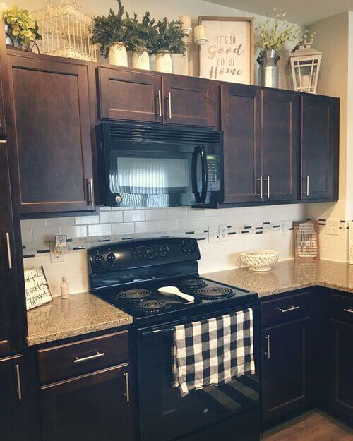 best decor for above kitchen cabinets