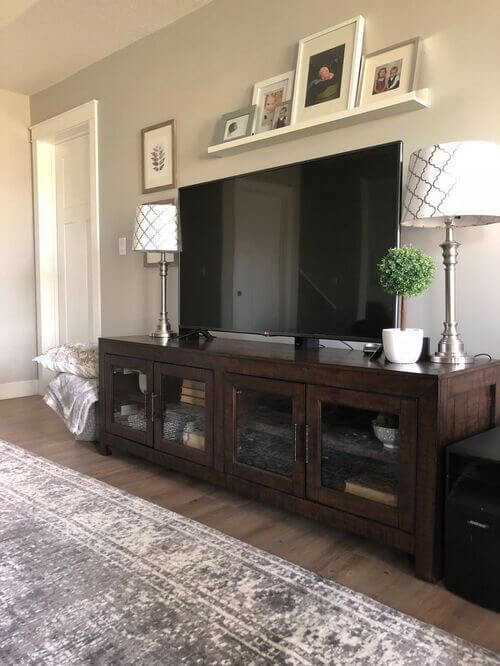 floating shelf over tv