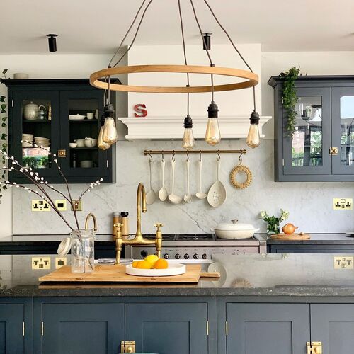 dark kitchen with marble backsplash