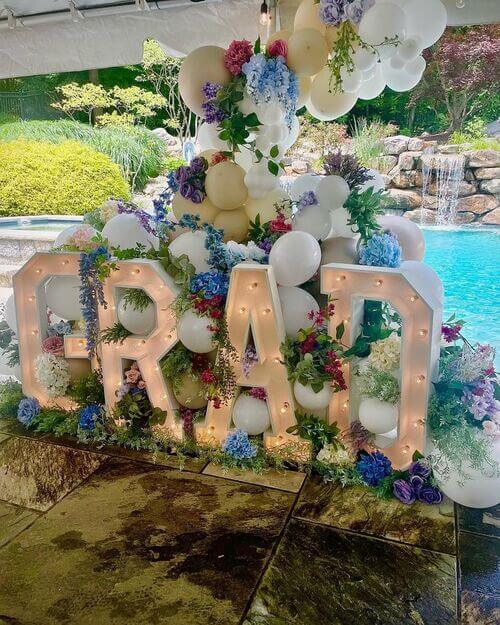 grad sign floral