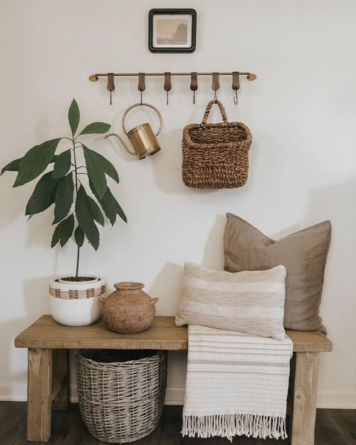 entryway with a bench