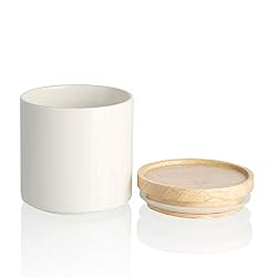 small ceramic jar with wooden lid
